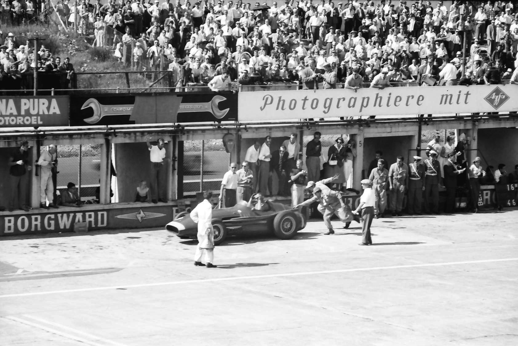 Fangio leaving the pits, German GP 1957